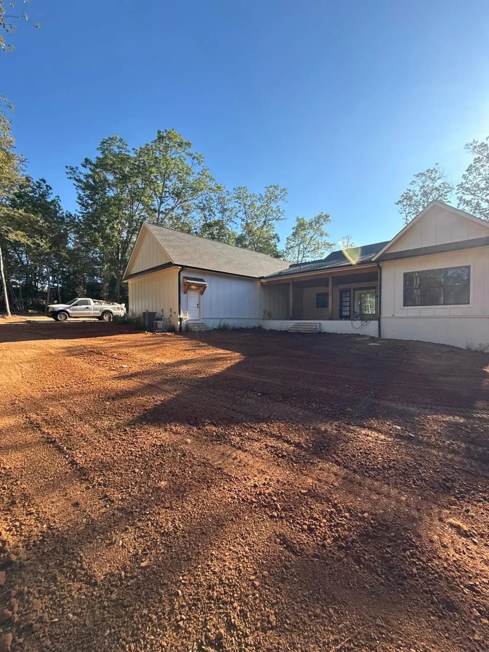Finished home on a freshly graded, build-ready site in Central Arkansas